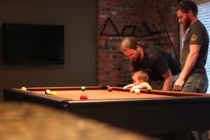 helping Daddy with his pool game