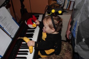 playing the piano with a banana and an angry bird